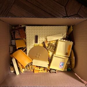 Brown/gold/yellow Lego assorted pieces